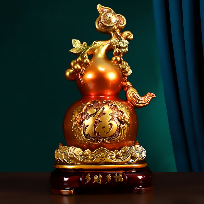 5 Symbols the Laughing Buddha Carries (And What They Mean for Your Home) oriental resin gourd sculpture – symbol of fortune & prosperity