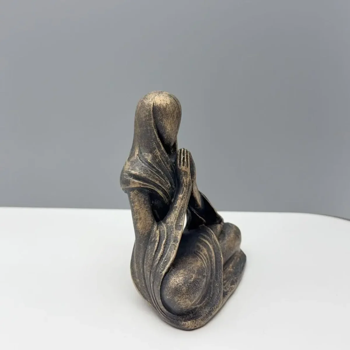 abstract meditating alien statue resin zen sculpture