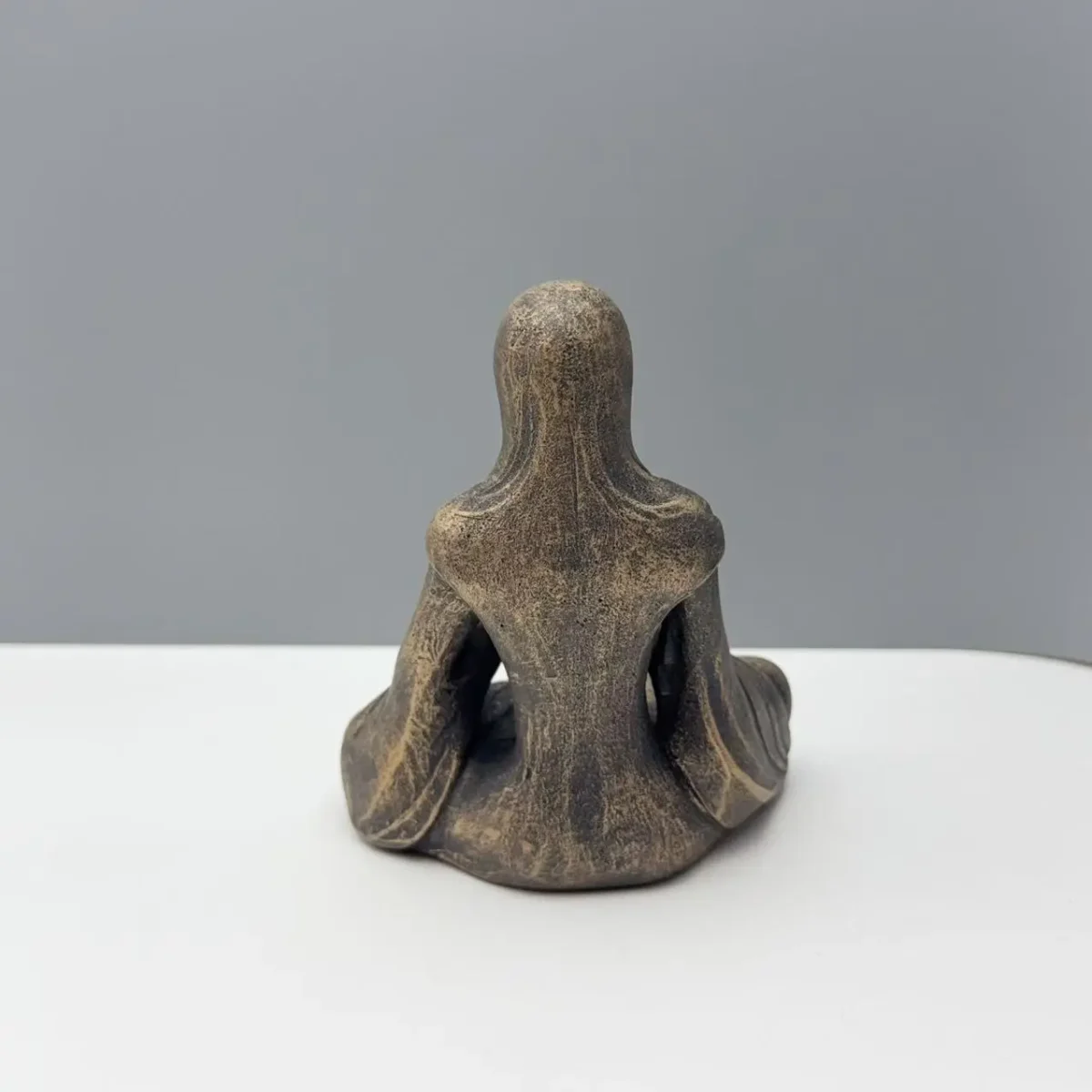 abstract meditating alien statue resin zen sculpture